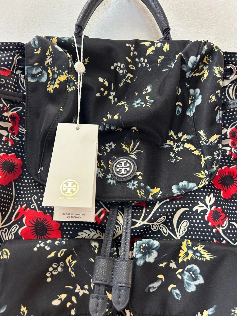 Tory Burch Black Floral Drawstring Backpack with Red and Cream Blooms
